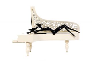 Lady of the piano sculpture 